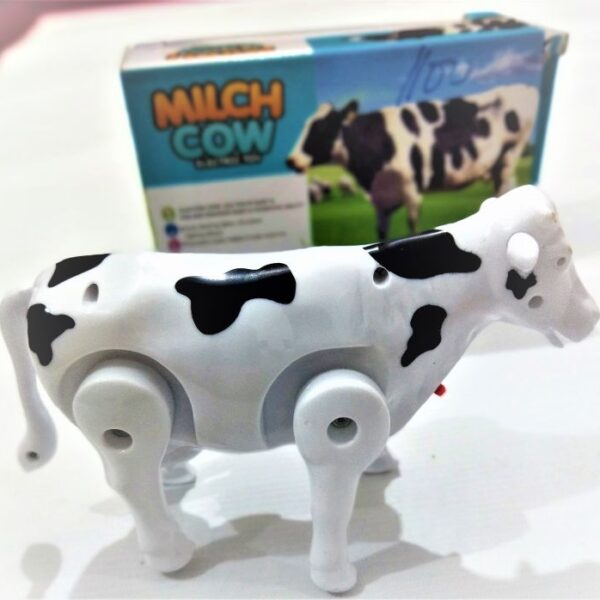 Funny Walking Musical Milch Cow Toy for Kids – Black & White Electric Animal with Lights, Sound & Moving Tail
